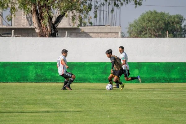 soccer players competing